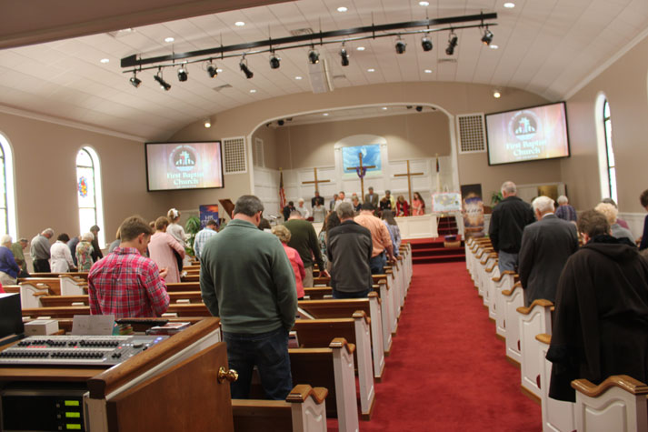 View of the sanctuary with people praying